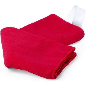 A red absorbent towel with a white loop, ideal for leisure and outdoor activities. It features a textured surface.
