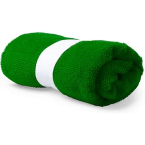 A rolled green absorbent towel with a white band, designed for leisure and outdoor activities.