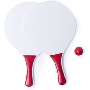 Two white beach rackets with red handles and a red ball positioned between them. The rackets have a branded logo.