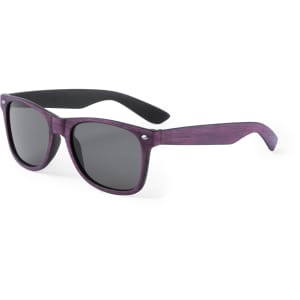 Purple sunglasses with grey lenses and a sleek design, featuring a logo on the temple. Suitable for leisure and outdoor activities.