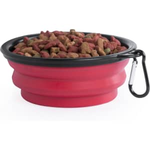 A red foldable bowl with a black rim, filled with pet food, featuring a carabiner attachment.