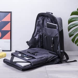 A grey and black backpack with compartments for a laptop, documents, and accessories, featuring a logo.