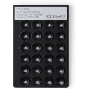 A black Privek Power Bank with a textured surface, featuring multiple circular indents and a branding logo.
