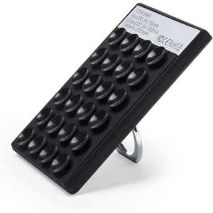 A black power bank with a textured surface and a stand on the back. It features a branding logo.