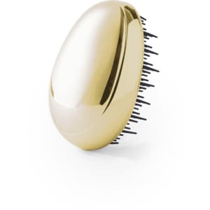 A gold hairbrush with black bristles and a smooth, oval-shaped design. It has a sleek and shiny finish.