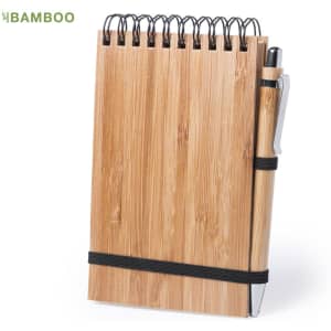 A bamboo notebook with a spiral binding and an attached pen, featuring a black elastic band.