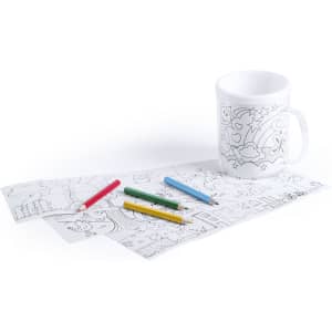 A white coffee mug sits alongside colouring sheets and colourful markers in red, green, yellow, and blue. The mug features a logo.