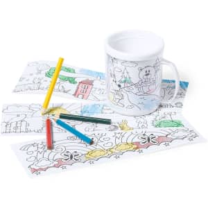 A white Fesient mug with colouring designs, surrounded by colourful markers and colouring pages.