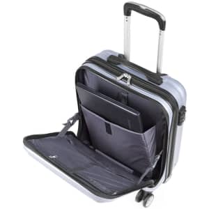 A wheeled travel bag in light blue, featuring multiple compartments and a retractable handle. It has a logo on the front.