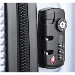 A black combination lock is attached to the zipper of a blue wheeled bag, featuring a smooth surface.