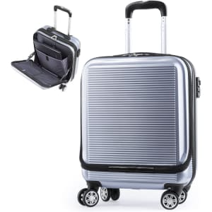 A silver wheeled bag with a textured surface and retractable handle, featuring an open compartment inside.
