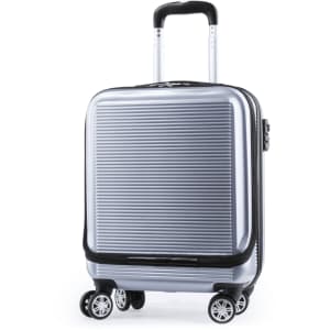 A silver wheeled trolley bag with a striped design and a retractable handle, featuring four wheels for easy movement.