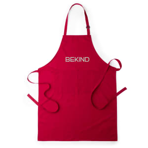 A red apron featuring a logo, designed with adjustable straps and a large front pocket.