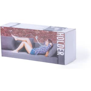A box for the Brenom Holder, featuring a model relaxing on a couch, showcasing a phone stand. The packaging has a logo.