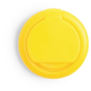 A yellow phone holder featuring a circular design and a central clasp. It has a simple, smooth surface.