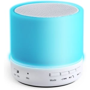 A blue speaker with a silver grille on top, featuring control buttons and a logo on the base.