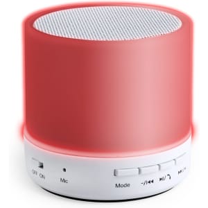 A red speaker with a white base features a mesh top and control buttons on the side. It includes a logo.