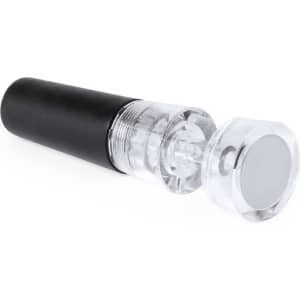 A drink bottle stopper in black and clear, with a cylindrical design and a shiny circular top.