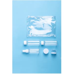 A clear toiletry bag with assorted travel-sized bottles and containers, all featuring white caps.