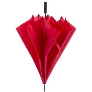 A red umbrella with a black handle, displaying multiple folded segments and a compact design.