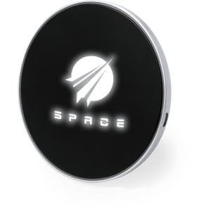 A round, black wireless charger with a white logo, featuring a sleek design and a glossy finish.
