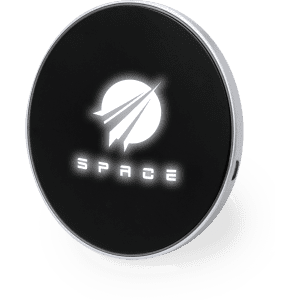 A black wireless charger with a silver edge features a logo on its surface. The design is sleek and modern.