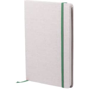 A notepad with a light grey fabric cover and a green elastic band, featuring a ribbon bookmark.