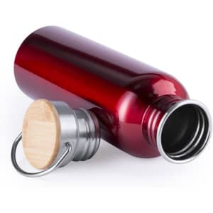 A drink bottle in a rich red colour with a metallic silver and bamboo screw cap, featuring a logo.