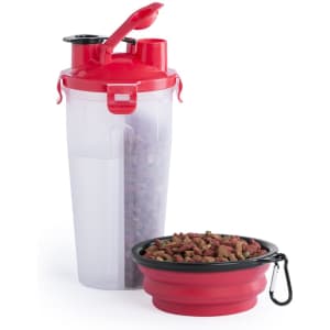 A red drink bottle with a detachable bowl, filled with pet food, featuring a clip for easy attachment.