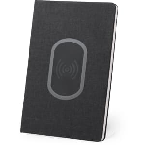 A black notepad with a textured cover and a built-in wireless charging pad on the front. It includes a logo.