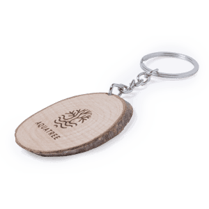 A wooden keyring featuring a natural wood slice with a logo, attached to a silver keychain.