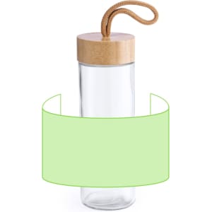 A drink bottle made of clear glass with a bamboo lid and a rope handle, featuring a green label around its body.