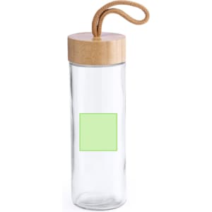 A drink bottle made of clear glass with a wooden lid and a rope handle. It features a blank green label.