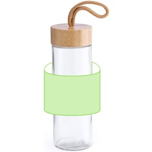 A drink bottle made of clear glass with a wooden cap and a rope handle. It features a blank green label.