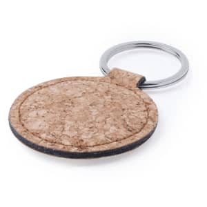 A circular keyring featuring a natural cork design with a metal ring for attachment.