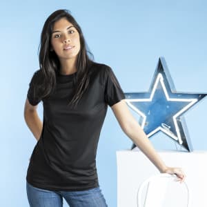 A black adult T-shirt displayed on a model against a blue background, featuring a star decoration nearby.