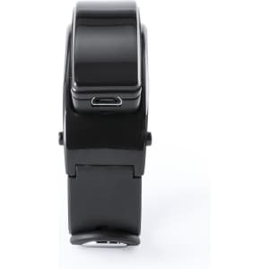 A black smart bracelet with a sleek design and a charging port, featuring a shiny surface.