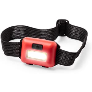 A red LED torch with a black adjustable strap, featuring a central light panel and a power button.