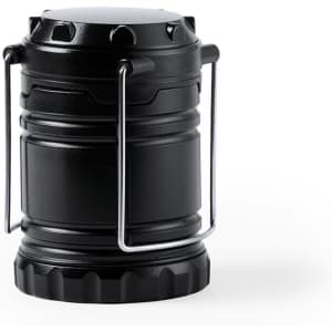 A black lantern with a foldable handle and a sturdy base, designed for outdoor leisure activities.