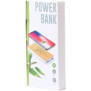 A power bank in a white box, featuring a bamboo design and an image of a smartphone charging wirelessly.