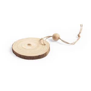 A wooden round decoration with a textured surface and a hanging string, featuring a small bead.