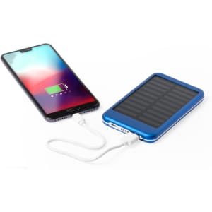 A blue power bank with a solar panel connected to a smartphone via a white charging cable.