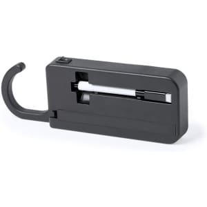 A black Katrin Message Hanger featuring a hook and a sliding mechanism for displaying messages. It has a branding logo.