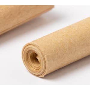 A roll of brown kraft paper, neatly coiled and resting on a light surface.