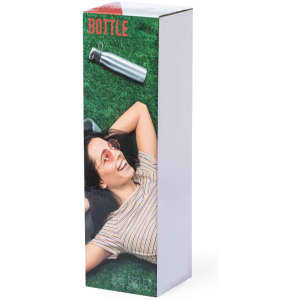 A drink bottle in a tall box, featuring a stainless steel design and a person relaxing outdoors. The box includes a branding logo.