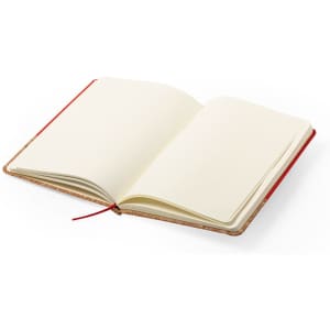 An open notepad with blank pages and a red spine, featuring a cork exterior and a ribbon bookmark.