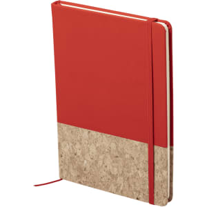 A red notepad with a cork bottom, featuring an elastic band and a logo on the cover.
