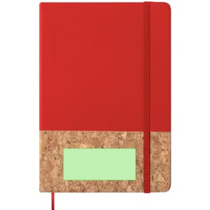 A red notepad with a cork base and an elastic closure, featuring a logo on the cover.