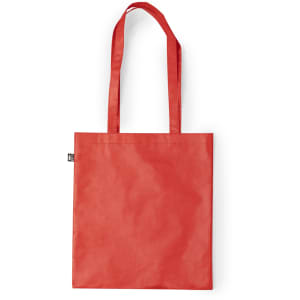 A red reusable grocery bag with two handles. The bag has a simple design and features a logo.