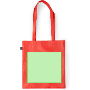 A red reusable grocery bag with a large green blank area in the centre, featuring two shoulder straps and a logo.